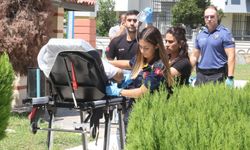 Eşiyle tartışıp, kendisini omzundan vurdu
