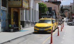 Taksisini götürmeye kalkışan kişiyi peşinden koşup yakaladı