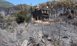 Emekli itfaiyeci evini yanmaktan kurtardı