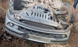 Takla atan otomobilden yara almadan kurtuldu