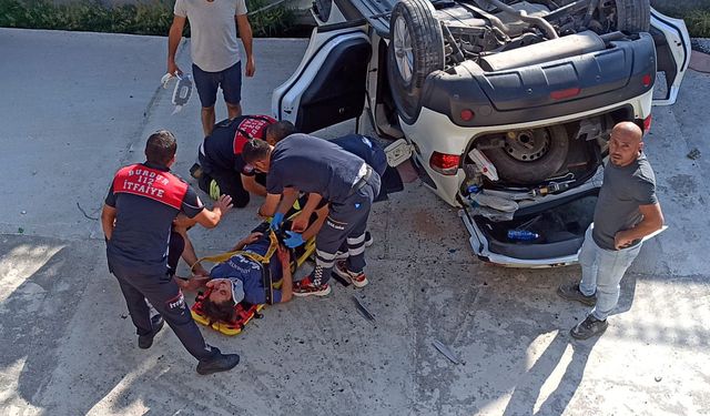 Dere yatağına düşen otomobilde anne oğul yaralandı