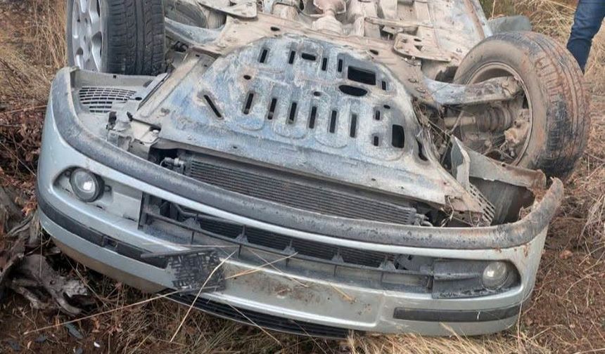 Takla atan otomobilden yara almadan kurtuldu
